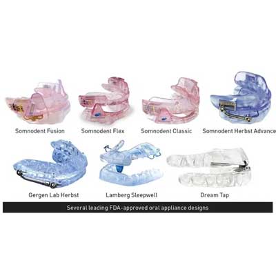 Display of seven different obstructive sleep apnea mouthguards in various colors such as pink, blue, baby blue & clear.