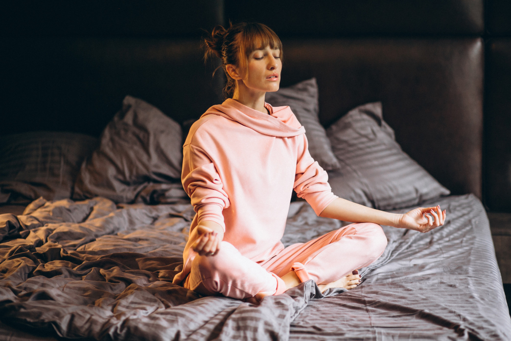A young woman in a Yoga Pose before bed and sleep